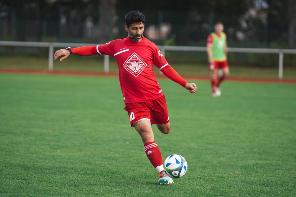 man playing soccer