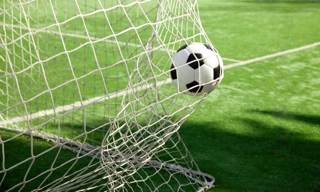 Soccer ball in goal net